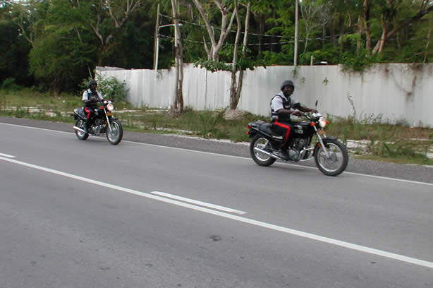 Volunteers Clean-Up Roadside Entrance to Negril - Negril Travel Guide