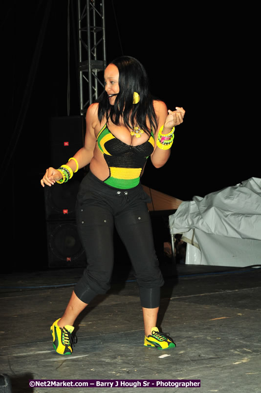 Usain Bolt of Jamaica - The Fastest Man In The World  - Usain Bolt Homecoming Celebrations Concert at the William Knibb High School Play Field, Trelawny - Ice, Ding Dong, Ravers Clavers, D'Angel, Voicemail, RDX and Dancers, Wayne Marshall, Tammi Chynn, Bugle, Nero, Tanya Stephens, Richie Spice, Kip Rich,and Shaggy - Photographs by Net2Market.com - Barry J. Hough Sr. Photojournalist/Photograper - Photographs taken with a Nikon D300 - Negril Travel Guide, Negril Jamaica WI - http://www.negriltravelguide.com - info@negriltravelguide.com...!