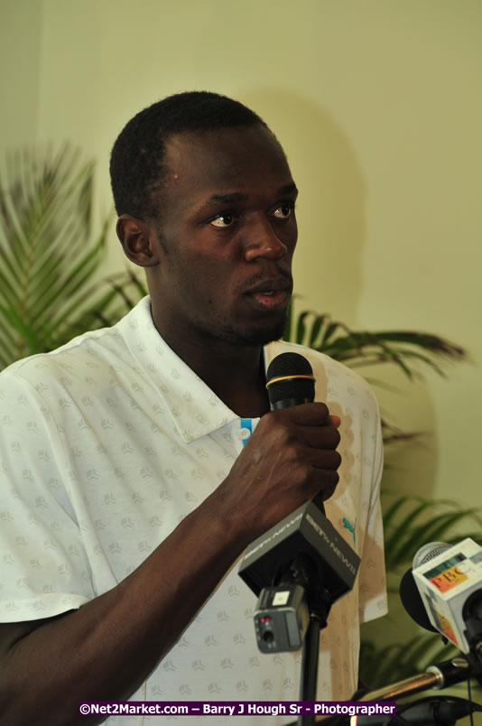 Usain Bolt of Jamaica - The Fastest Man In The World  - Usain Bolt Homecoming Celebrations - Press Conference at the Grand Bahia Principe &amp; Sherwood Content - Waldensia Primary School - Photographs by Net2Market.com - Barry J. Hough Sr. Photojournalist/Photograper - Photographs taken with a Nikon D300 - Negril Travel Guide, Negril Jamaica WI - http://www.negriltravelguide.com - info@negriltravelguide.com...!