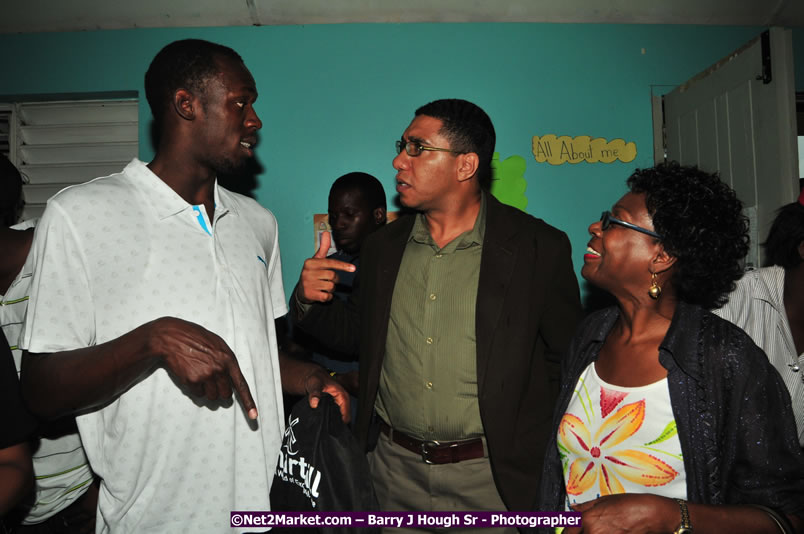 Usain Bolt of Jamaica - The Fastest Man In The World  - Usain Bolt Homecoming Celebrations - Press Conference at the Grand Bahia Principe &amp; Sherwood Content - Waldensia Primary School - Photographs by Net2Market.com - Barry J. Hough Sr. Photojournalist/Photograper - Photographs taken with a Nikon D300 - Negril Travel Guide, Negril Jamaica WI - http://www.negriltravelguide.com - info@negriltravelguide.com...!