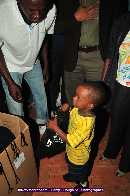 Usain Bolt of Jamaica - The Fastest Man In The World  - Usain Bolt Homecoming Celebrations - Press Conference at the Grand Bahia Principe &amp; Sherwood Content - Waldensia Primary School - Photographs by Net2Market.com - Barry J. Hough Sr. Photojournalist/Photograper - Photographs taken with a Nikon D300 - Negril Travel Guide, Negril Jamaica WI - http://www.negriltravelguide.com - info@negriltravelguide.com...!